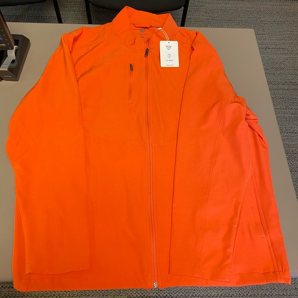 Graham Luxe Kash golf jacket. Color is called red/orange. - Picture 1 of 3